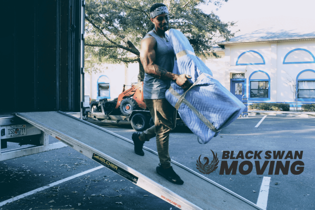 Professional movers handling furniture with care.