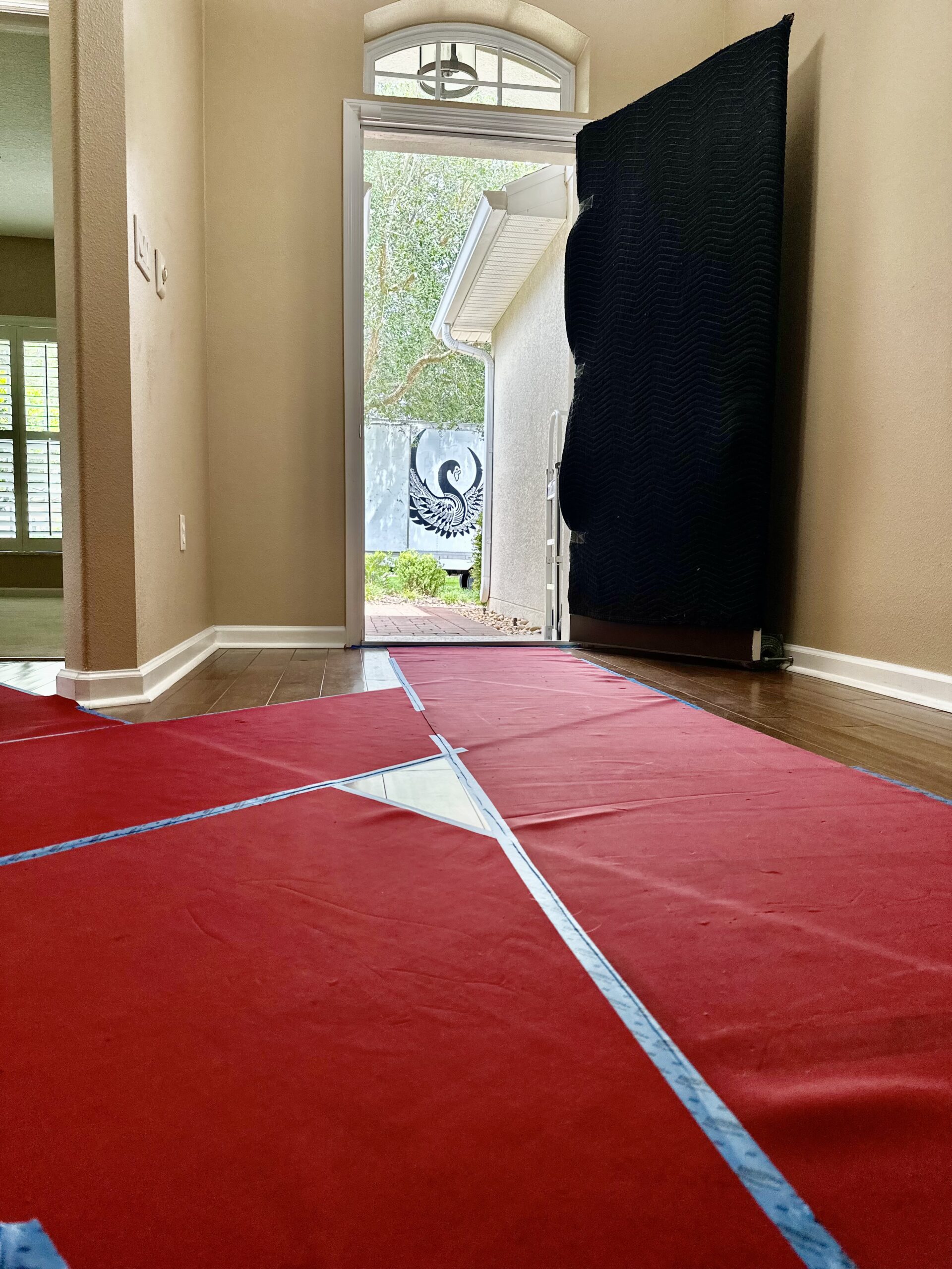 Floor runners and doorway protection installed for a residential move